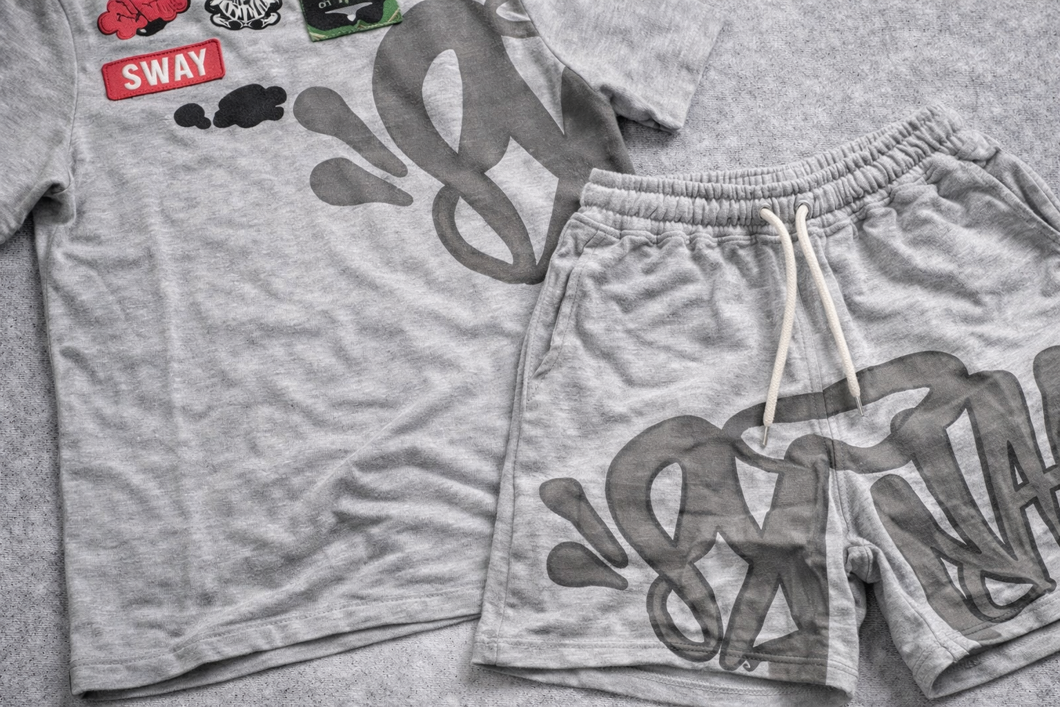 Conjunto Camiseta e Bermuda Syna World cinza cinza